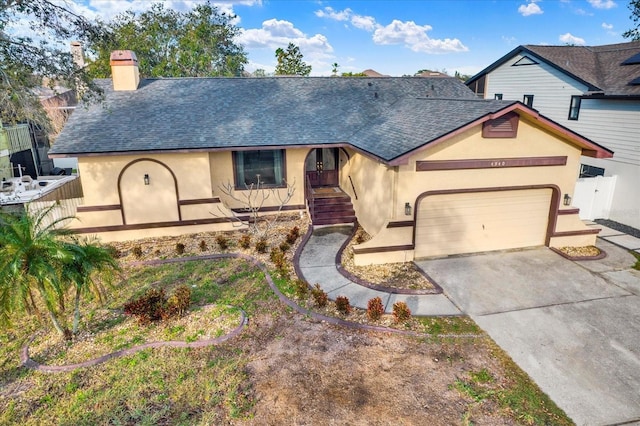 single story home with a garage