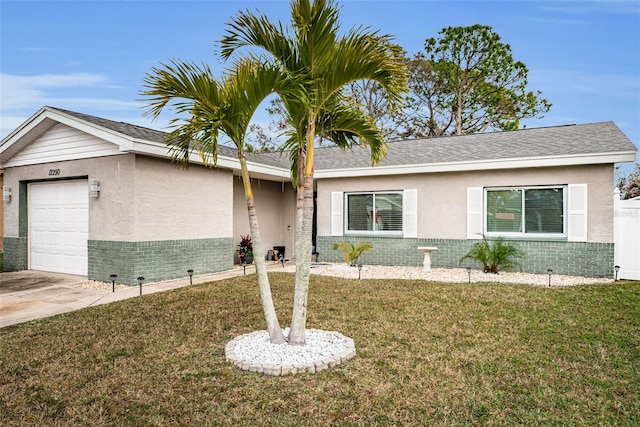 ranch-style house with a garage and a front yard