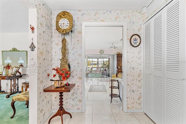 corridor featuring light tile patterned flooring