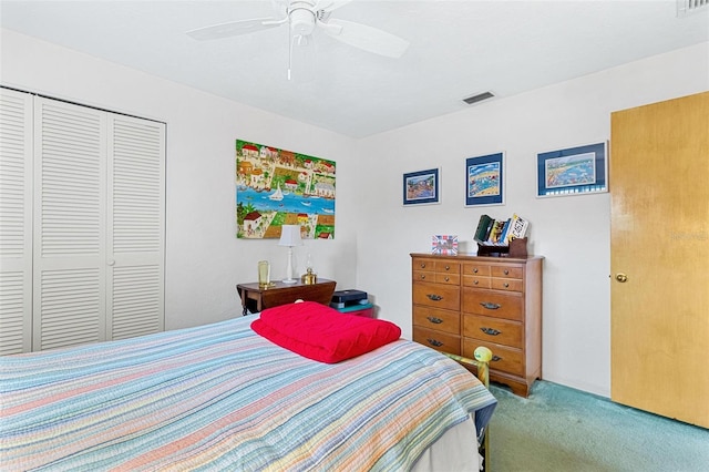 bedroom with carpet, ceiling fan, and a closet