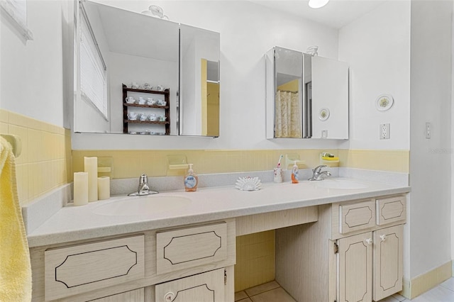 bathroom with vanity and tile patterned floors