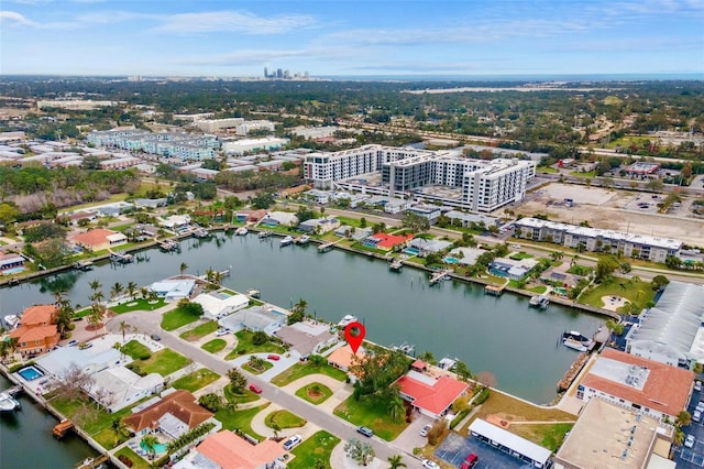 drone / aerial view with a water view