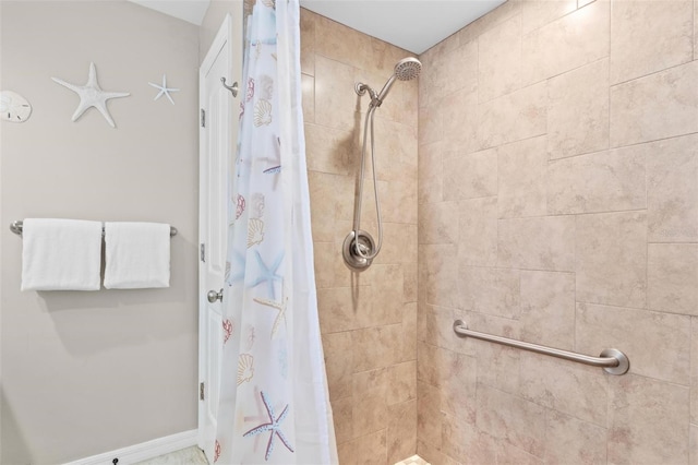 bathroom with a shower with curtain