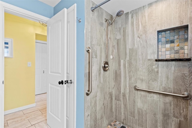 bathroom featuring a tile shower