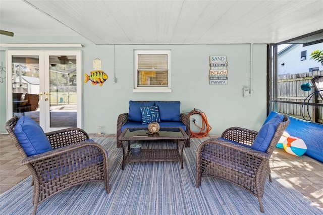 deck featuring a patio, outdoor lounge area, and french doors