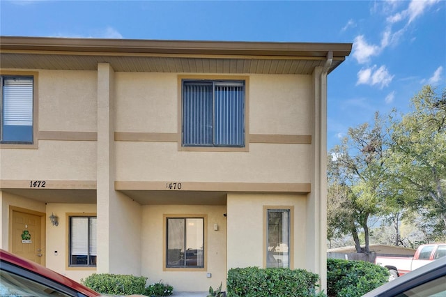 view of front of home featuring stucco siding