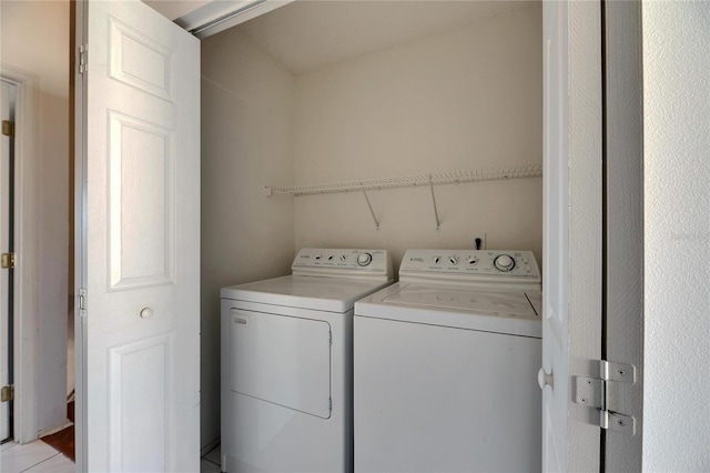 laundry area with laundry area and washer and dryer