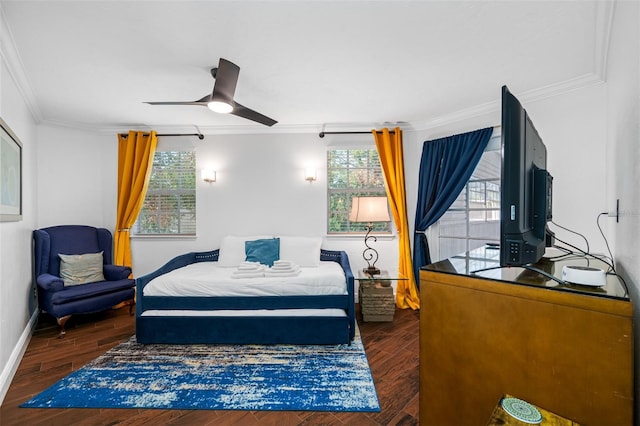 bedroom featuring ceiling fan and ornamental molding