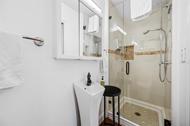 bathroom featuring walk in shower