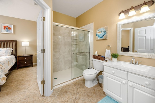 bathroom with vanity, toilet, and an enclosed shower