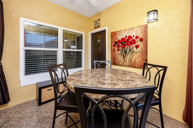 dining space featuring ceiling fan