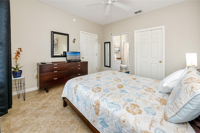 bedroom with ensuite bath and ceiling fan