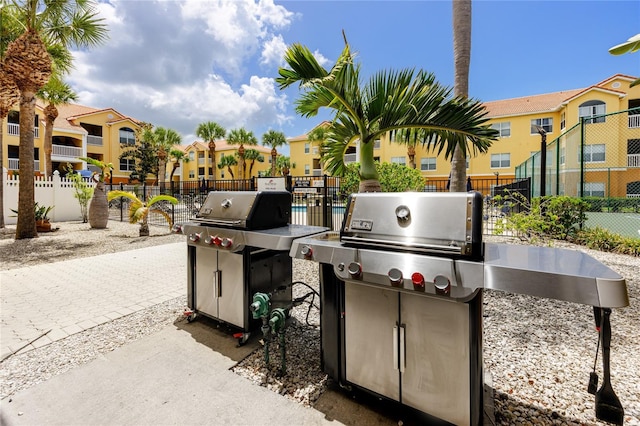 view of patio featuring a grill and exterior kitchen