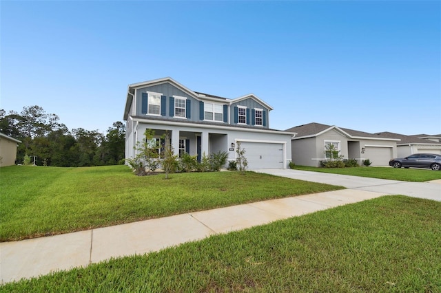 view of front of home featuring a garage and a front yard