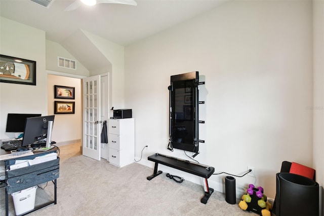 exercise area featuring lofted ceiling, light carpet, ceiling fan, and french doors