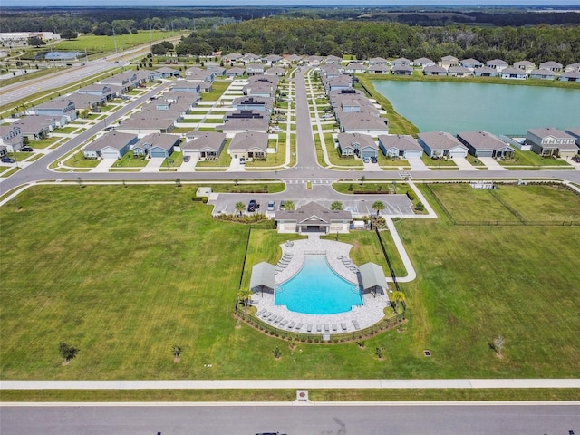 drone / aerial view with a water view