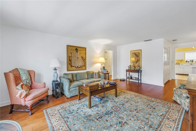 living room with hardwood / wood-style flooring