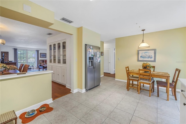 view of tiled dining space