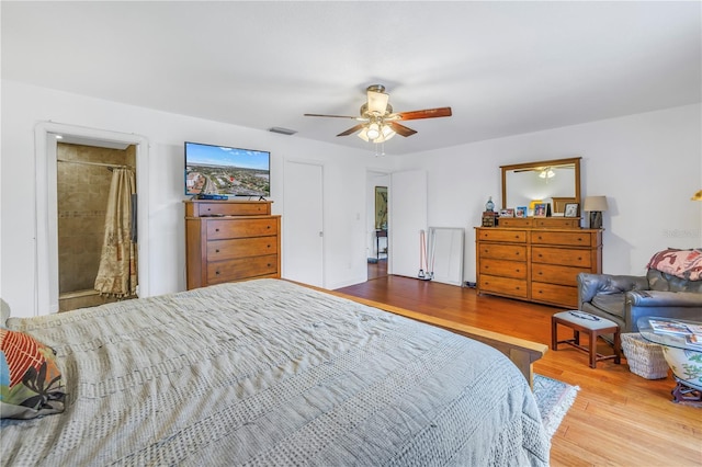 bedroom with ceiling fan and light wood-type flooring