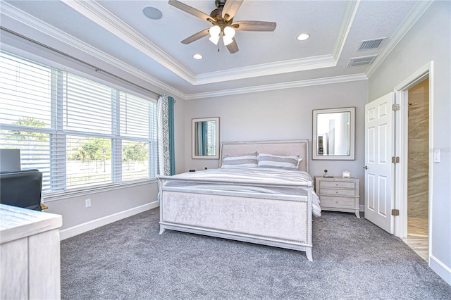 carpeted bedroom with crown molding, a raised ceiling, and ceiling fan