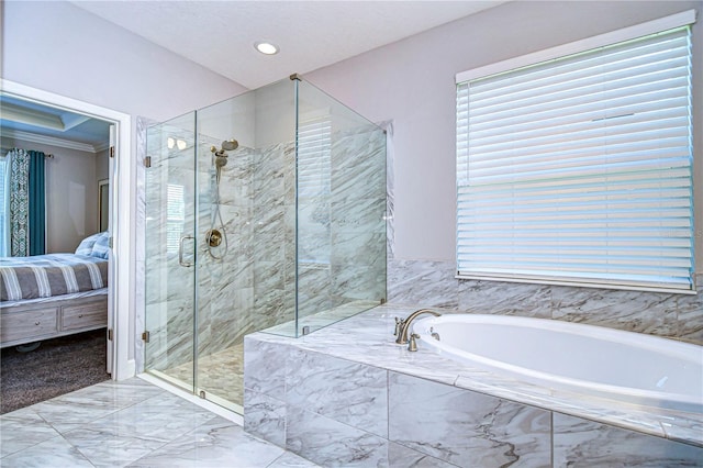 bathroom with shower with separate bathtub