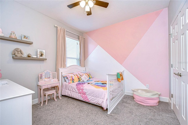 carpeted bedroom featuring vaulted ceiling and ceiling fan