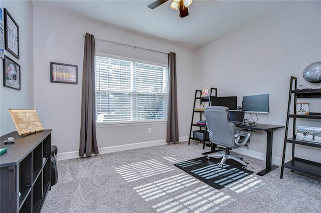 office area featuring light colored carpet and ceiling fan