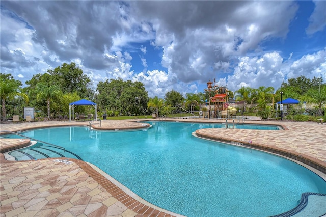 view of swimming pool featuring a patio