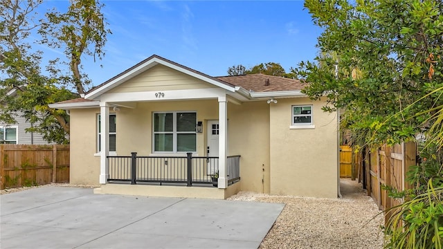 bungalow-style home featuring a patio