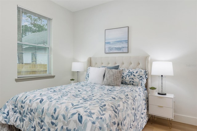 bedroom featuring hardwood / wood-style floors