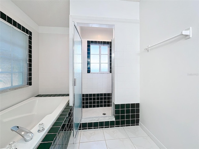 bathroom with independent shower and bath