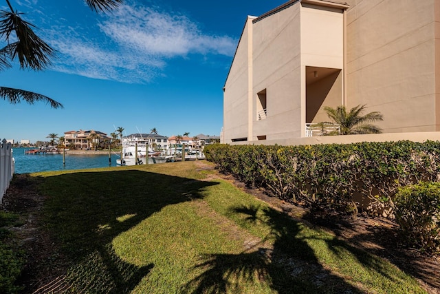 view of yard with a water view