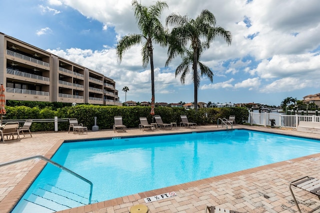 view of swimming pool featuring a patio