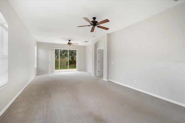 spare room with ceiling fan