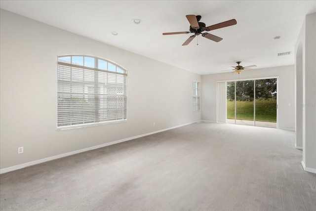 empty room with carpet flooring