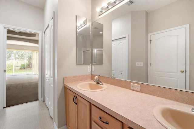 bathroom featuring vanity and tile patterned flooring