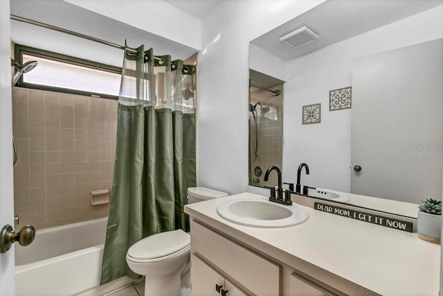 full bathroom with vanity, shower / tub combo with curtain, and toilet