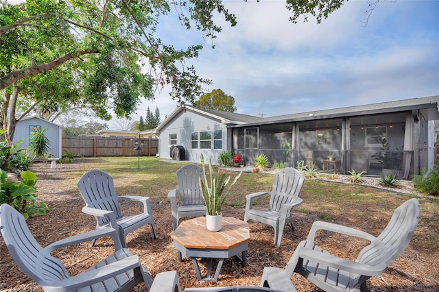 view of patio / terrace with a sunroom