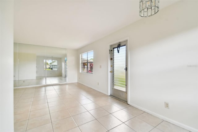 empty room featuring light tile patterned floors