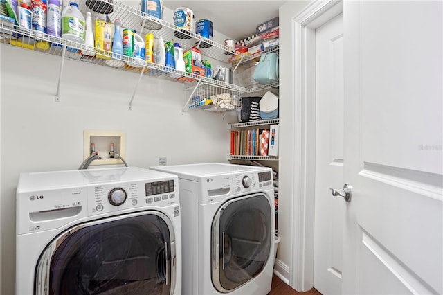 washroom featuring washing machine and dryer