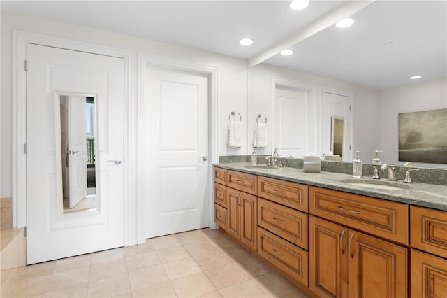 bathroom featuring vanity and tile patterned floors