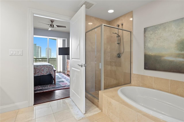 bathroom with ceiling fan, tile patterned floors, and separate shower and tub