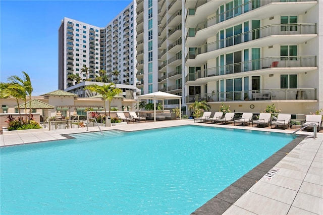 view of swimming pool featuring a patio area