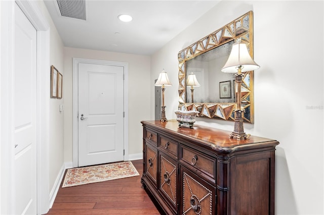 interior space with dark hardwood / wood-style flooring