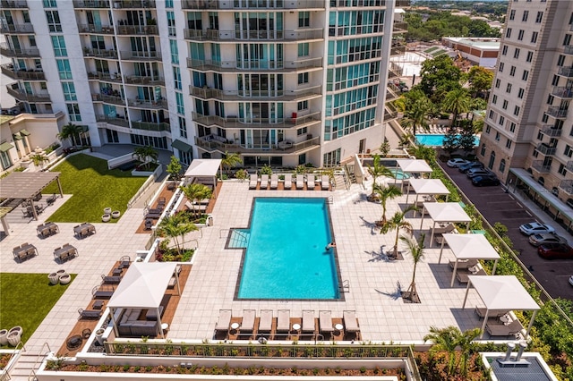 view of swimming pool with a patio