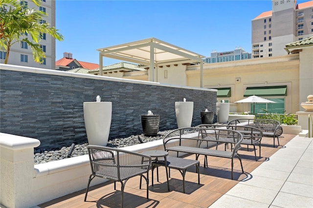 view of patio / terrace with a balcony