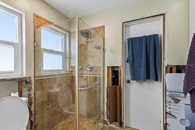 bathroom featuring walk in shower