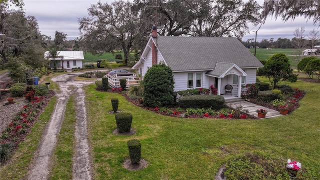 view of front of home with a front yard