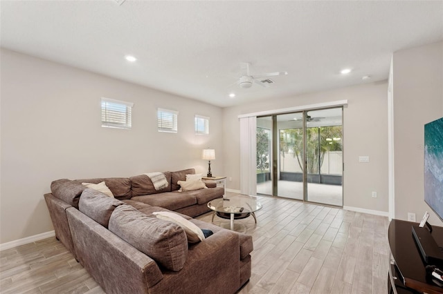 living room with light hardwood / wood-style flooring