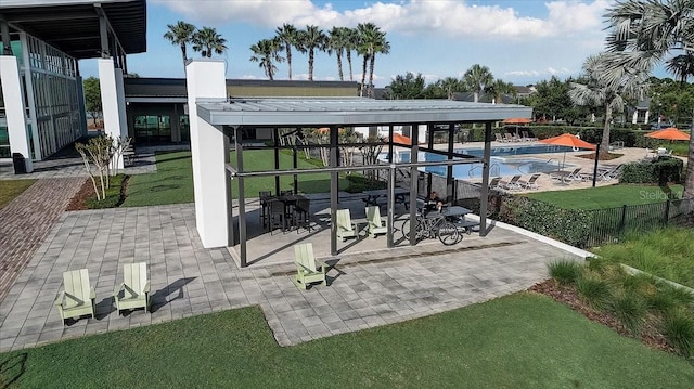 view of patio featuring a community pool